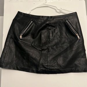 Black, faux leather skirts, from forever, 21 sz large, back zipper to zip pocket